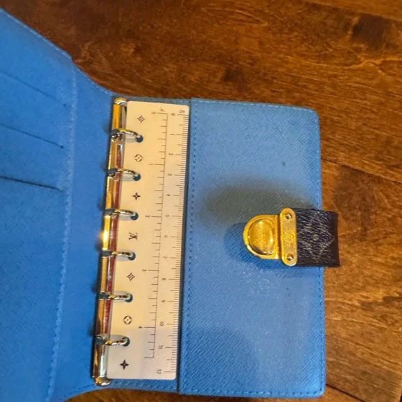 Louis Vuitton calendar holder.
